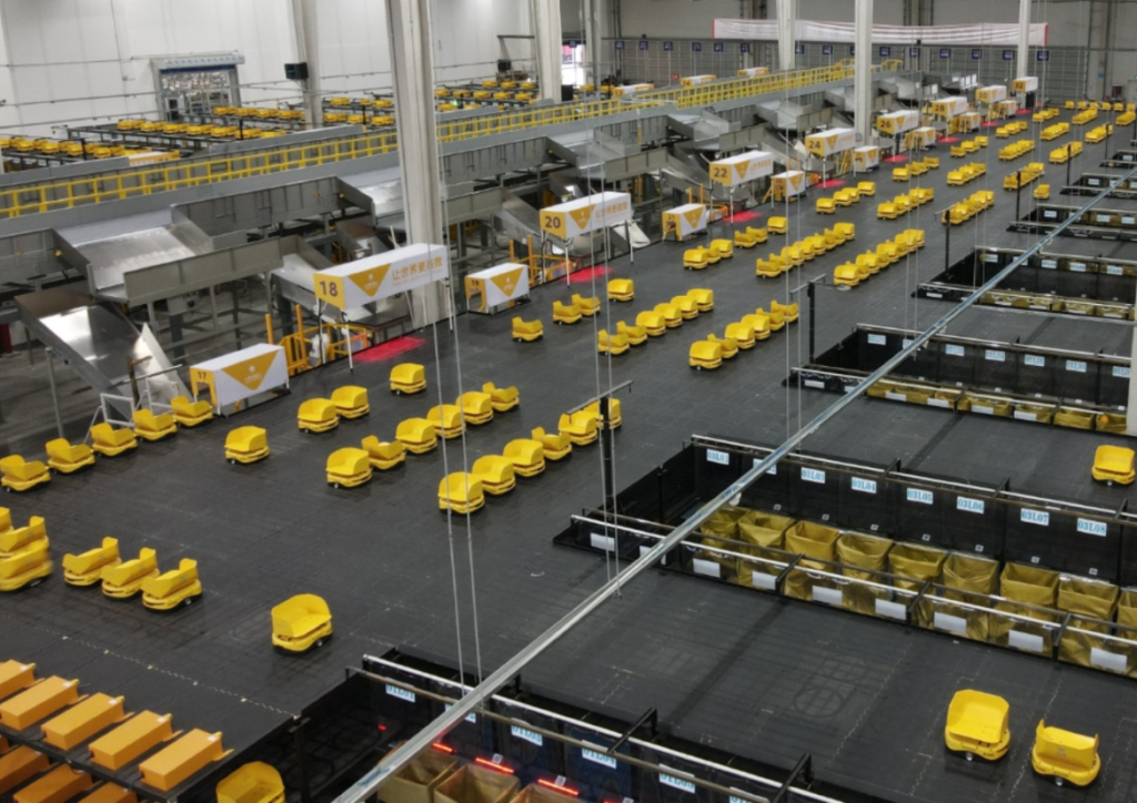 Mini AGVs transferring goods